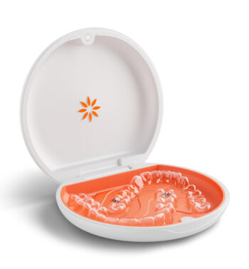 Open box of Invisalign clear aligners