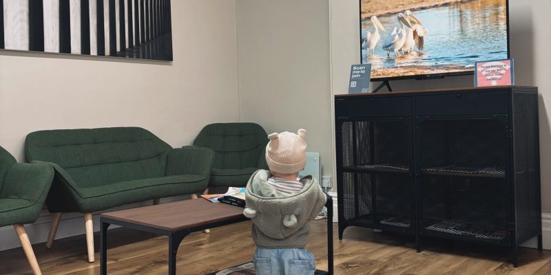 Child in Dental Waiting Room showing family dentistry in Oswestry